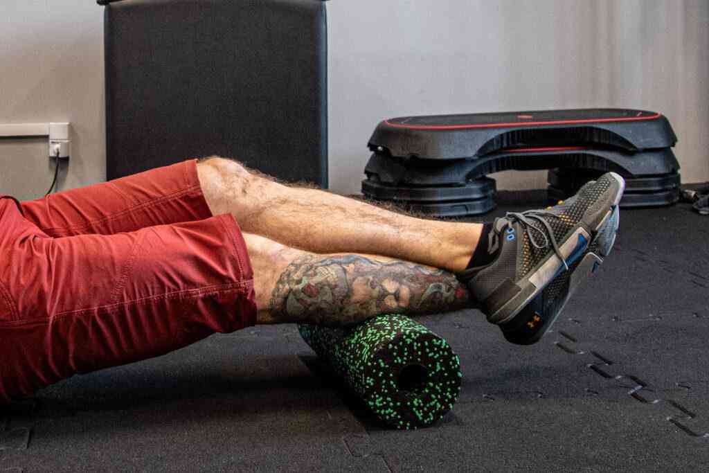 Przysiad ze sztangą z tyłu: kompedium 9 rolowanie - automasaż łydki - mobilizacja do back squat
