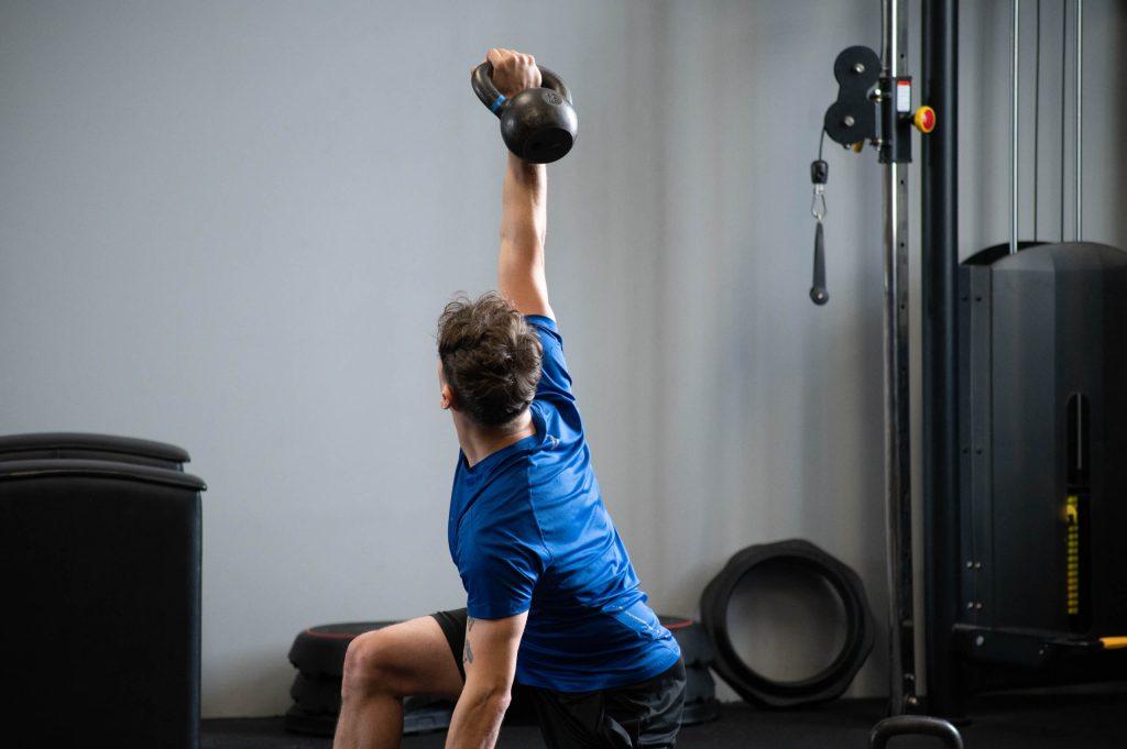 half kneeling windmill